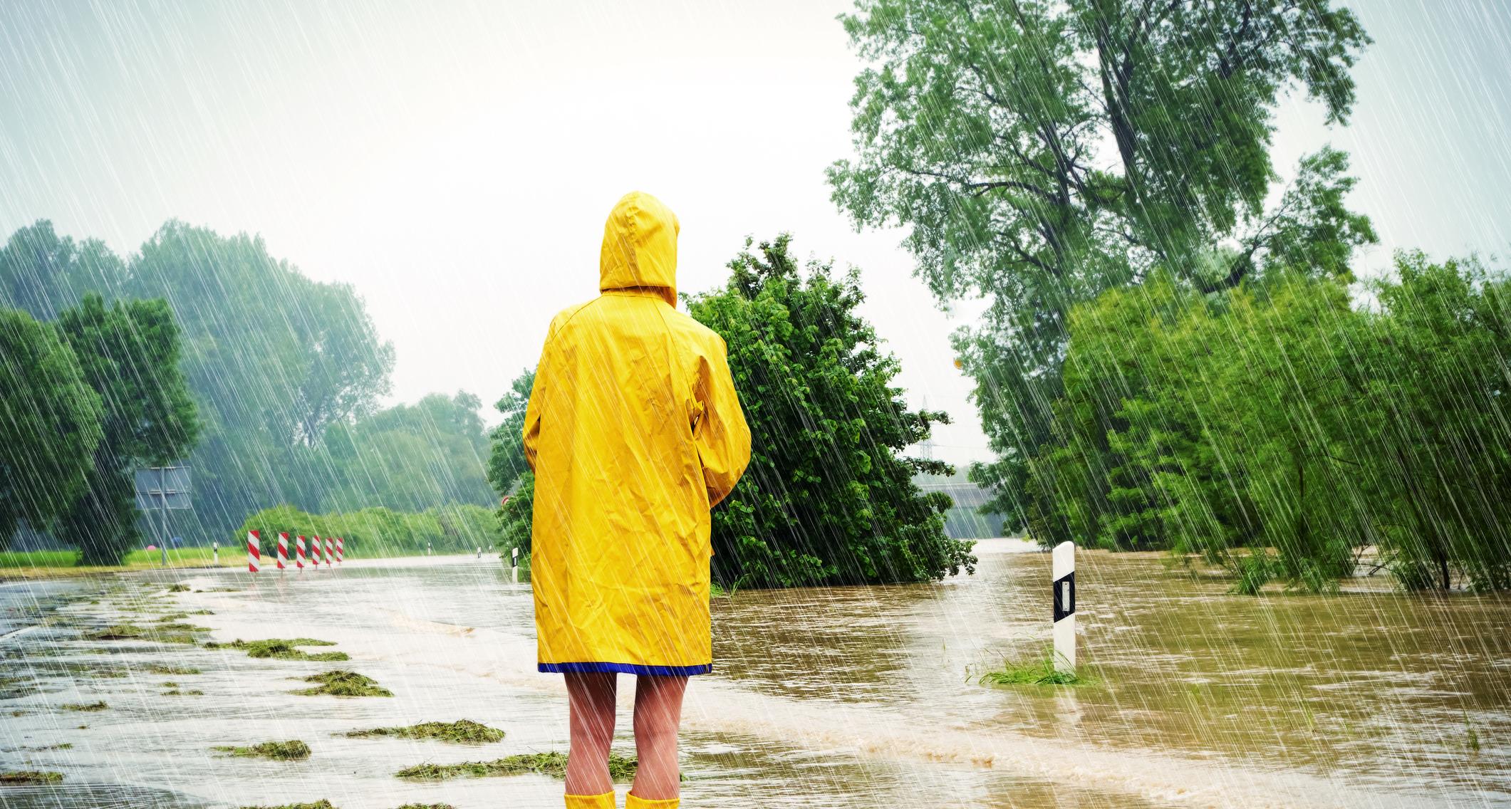 Person standing on a flooded street