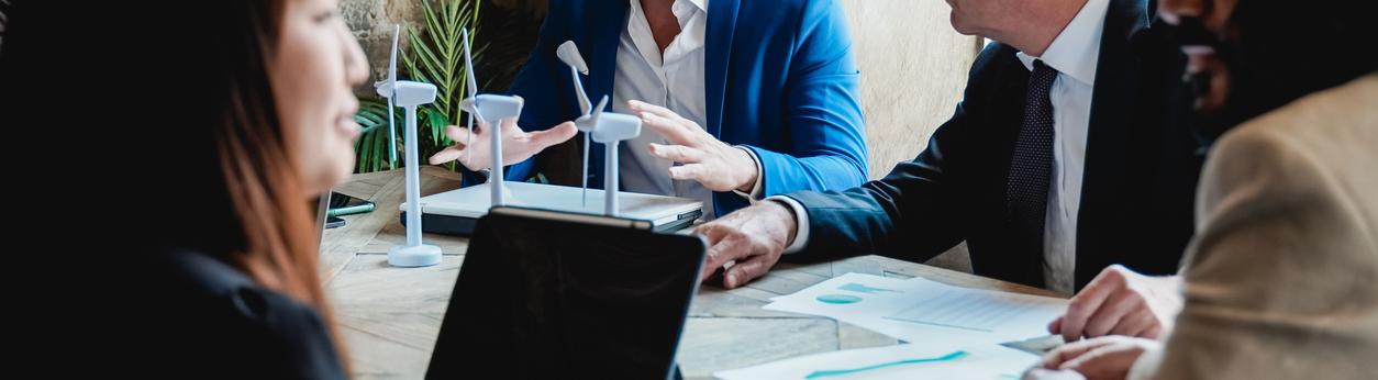 A group of business people around a table