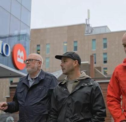 four men standing